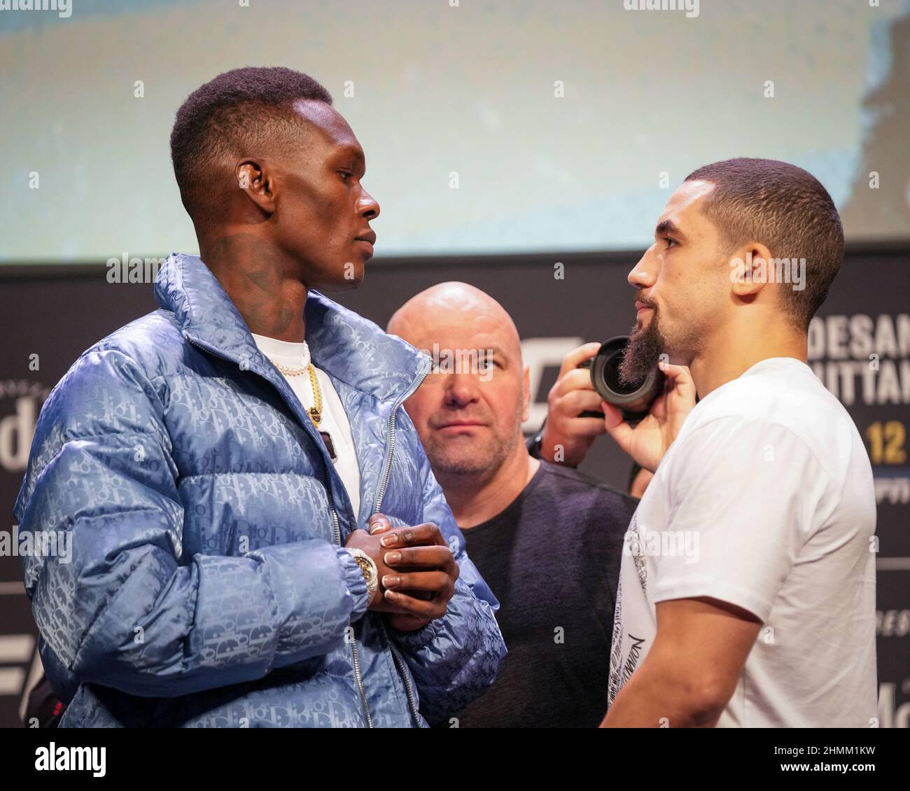 HOUSTON, TX - February 10: Israel Adesanya (L) and Robert Whittaker (R) face-off at Toyota Center for UFC 271: Adesanya vs. Whittaker 2 - Press Conference on February 10, 2022 in Houston, Texas, United States. (Photo by Louis Grasse/PxImages) Stock Photo
