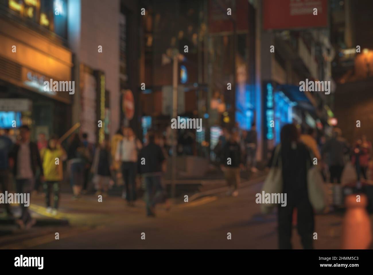 Blurred abstract background of people walking on the street at Night ...