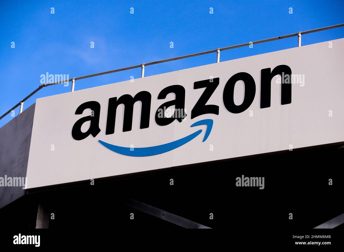Amazon logo and signage at their disruption and delivery hub in Belfast, Northern Ireland. Stock Photo