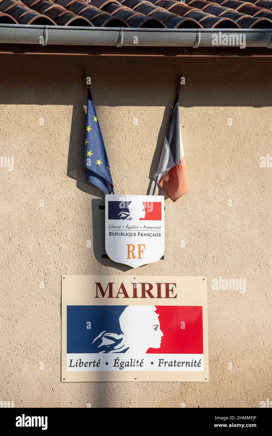 Charpey (south-eastern France): pediment of the Town Hall with a French and European flag, the bust of Marianne and motto Liberty, Equality, Fraternity Stock Photo