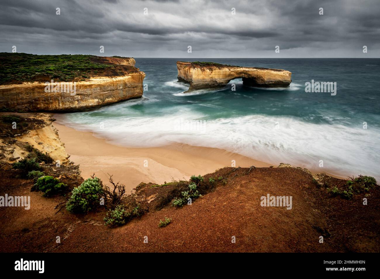 Famous London Bridge in Port Campbell National Park at the iconic Great Ocean Road. Stock Photo
