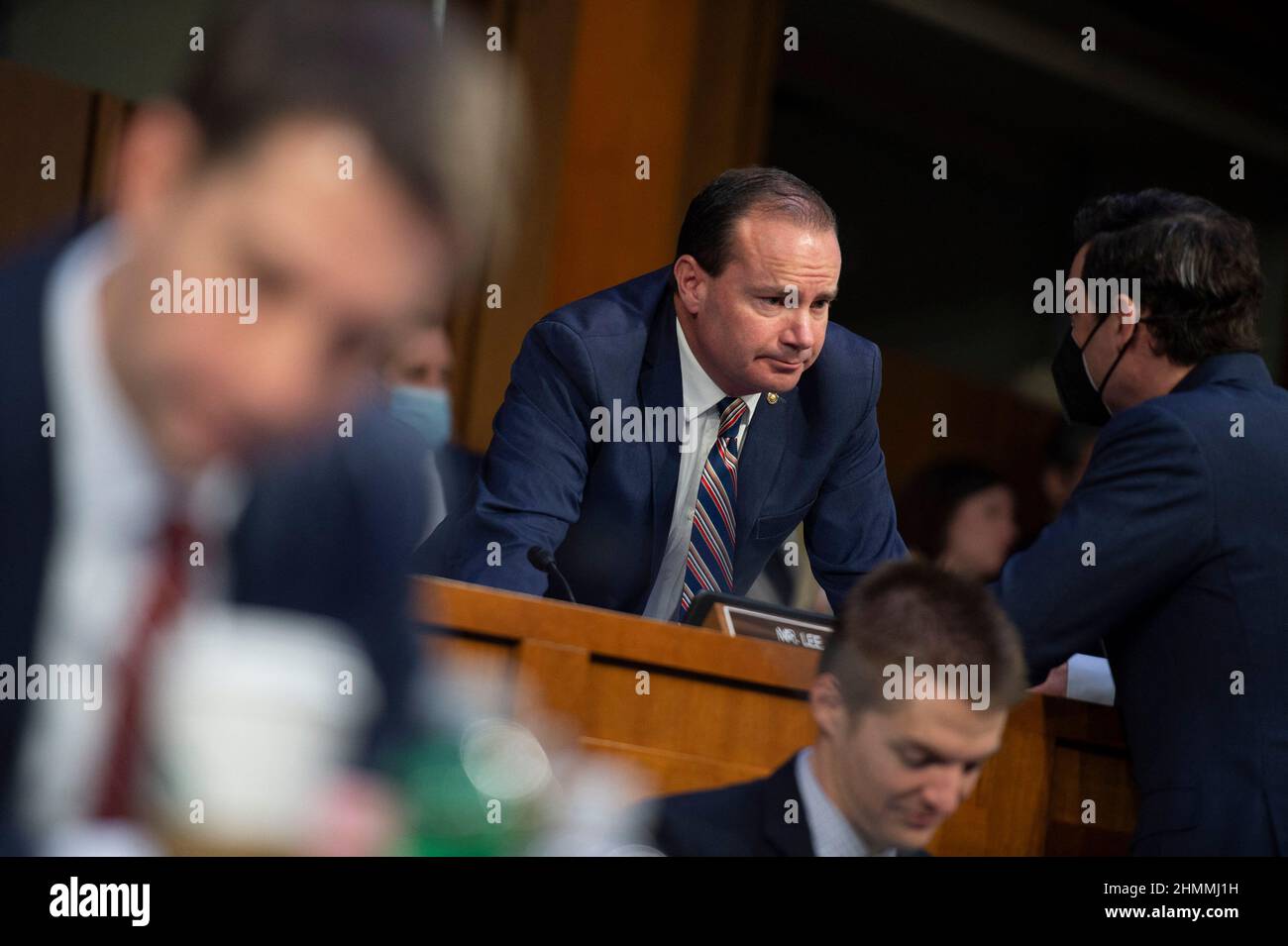 Sen. Mike Lee, R-UT, and Sen. Jon Ossoff, D-GA, speak during a Senate Judiciary executive business meeting at the US Capitol in Washington, DC, USA on Thursday, February 10, 2022. Photo by Bonnie Cash/CNP/ABACAPRESS.COM Stock Photo