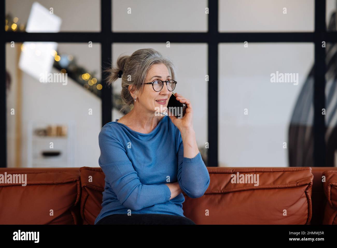 Image of senior woman talking on smartphone Stock Photo - Alamy