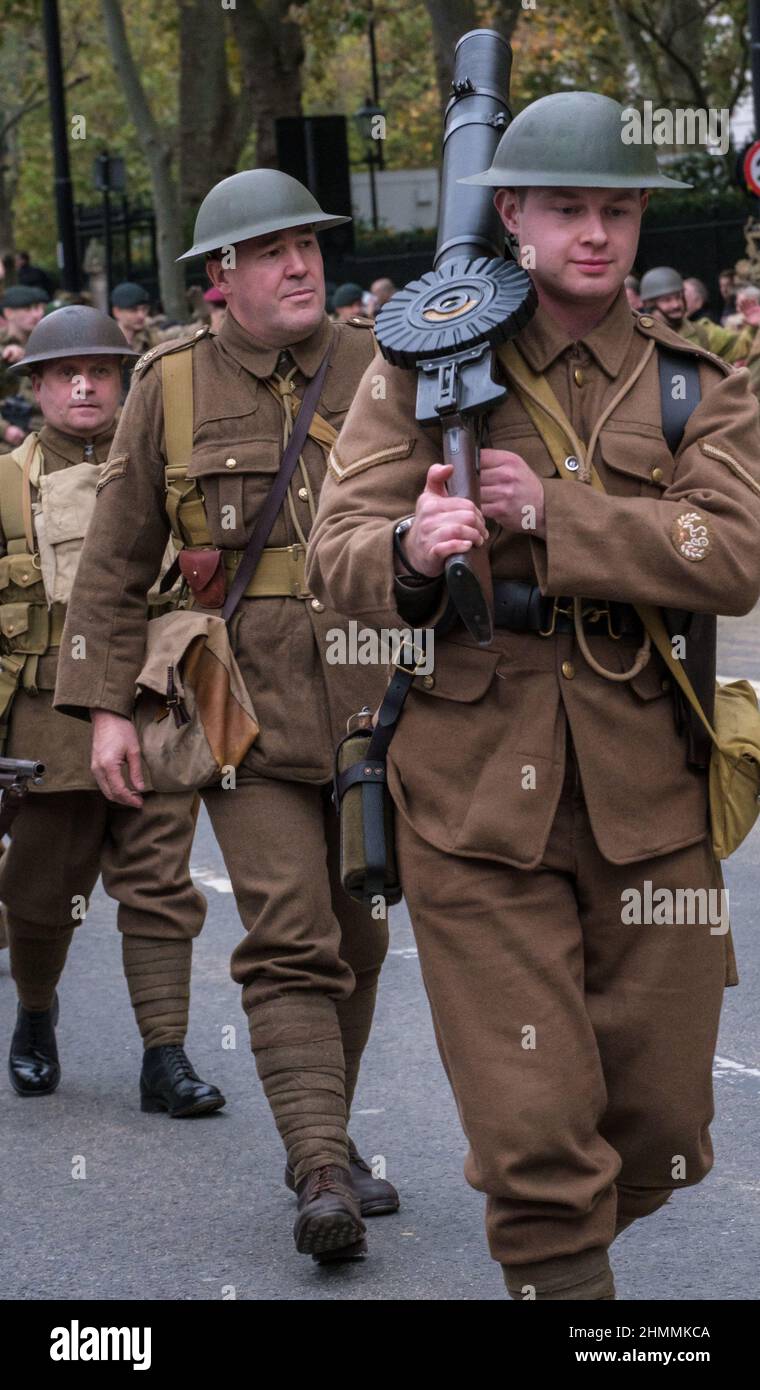 Man in World War 1 army uniform with a Lewis gun on his shoulder in the Lord Mayor’s show 2021, Victoria Embankment, London. Stock Photo