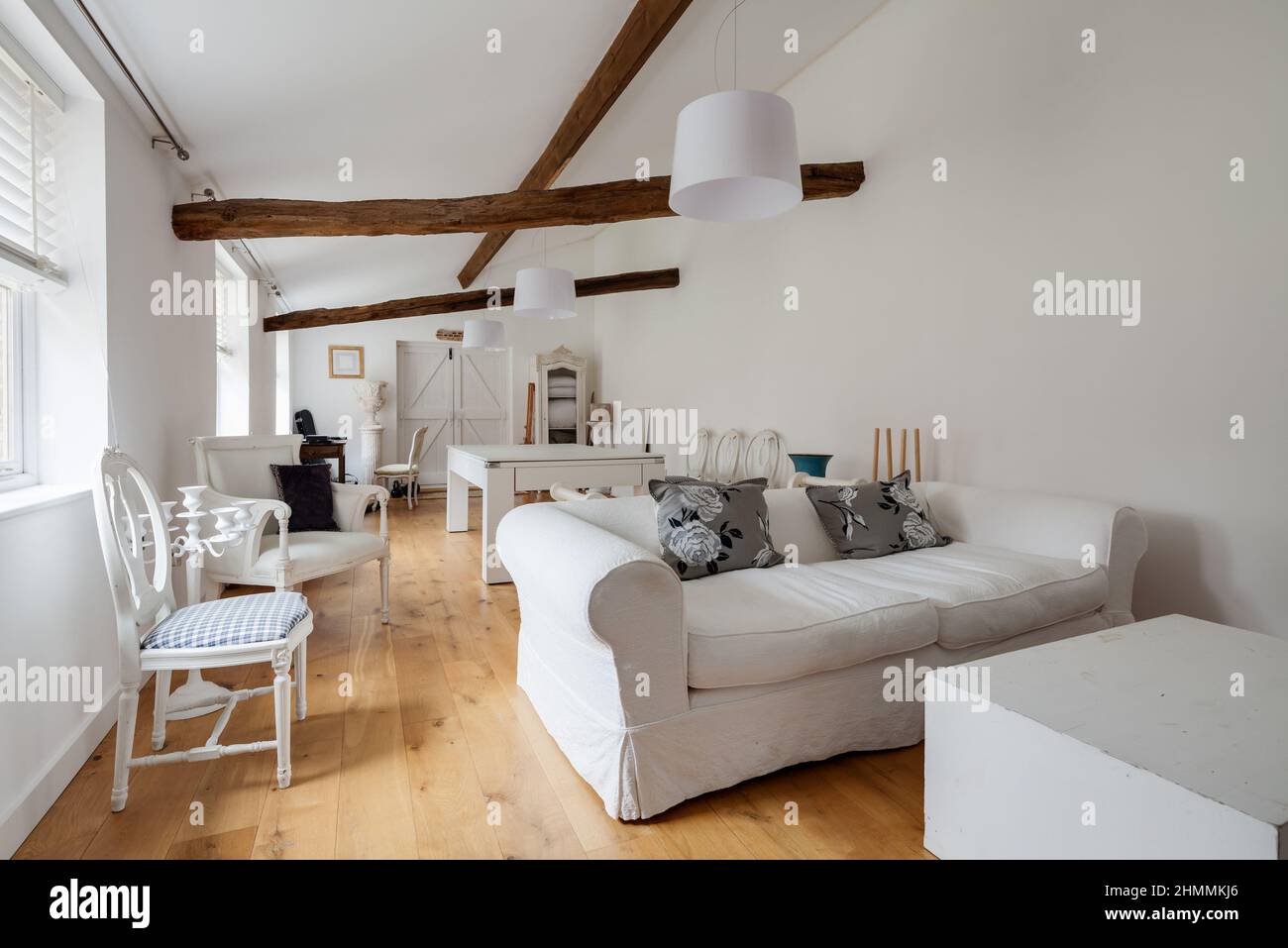 Newport, Essex - July 10 2018: Striking white painted lounge with matching white furniture Stock Photo