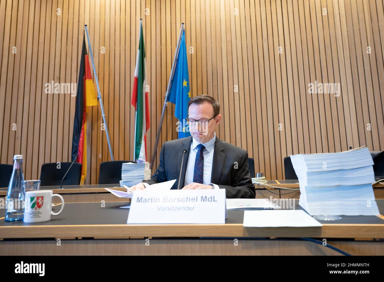 Duesseldorf, Germany. 11th Feb, 2022. Martin Börschel (SPD), Chairman of the Lügde Investigation Committee, sits in his seat. After hearing more than 120 witnesses, hearing more than 20 experts and evaluating files, Börschel has drafted an interim report with recommendations for action. Now the parliamentary groups are to be given the opportunity to read and revise this draft report. The result is expected to be acknowledged by the state parliament in the March plenary session. Credit: Federico Gambarini/dpa/Alamy Live News Stock Photo