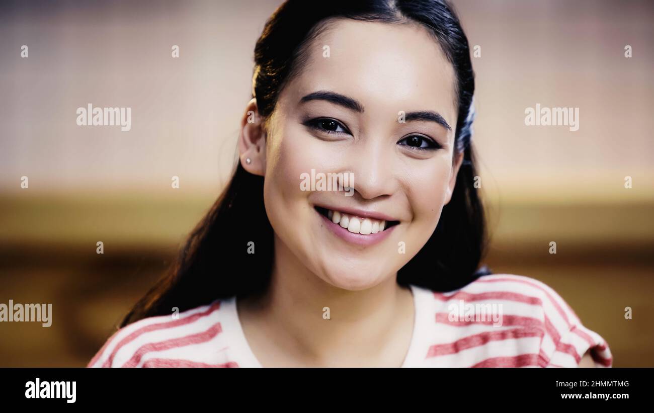 Happy asian woman notebook hi-res stock photography and images - Alamy