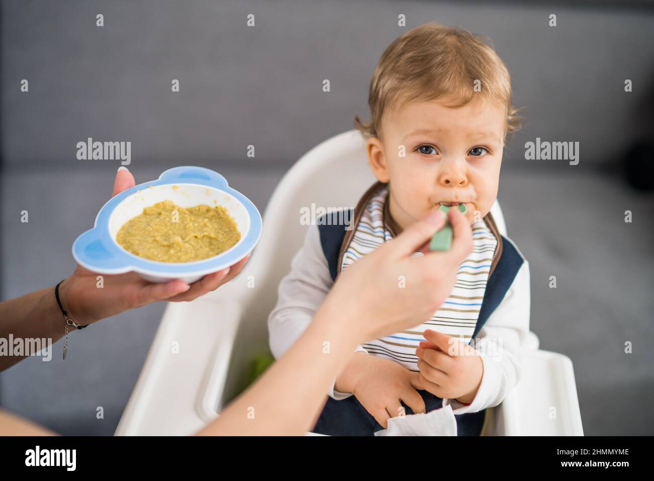 Angry baby boy doesn't want to eat Stock Photo Alamy