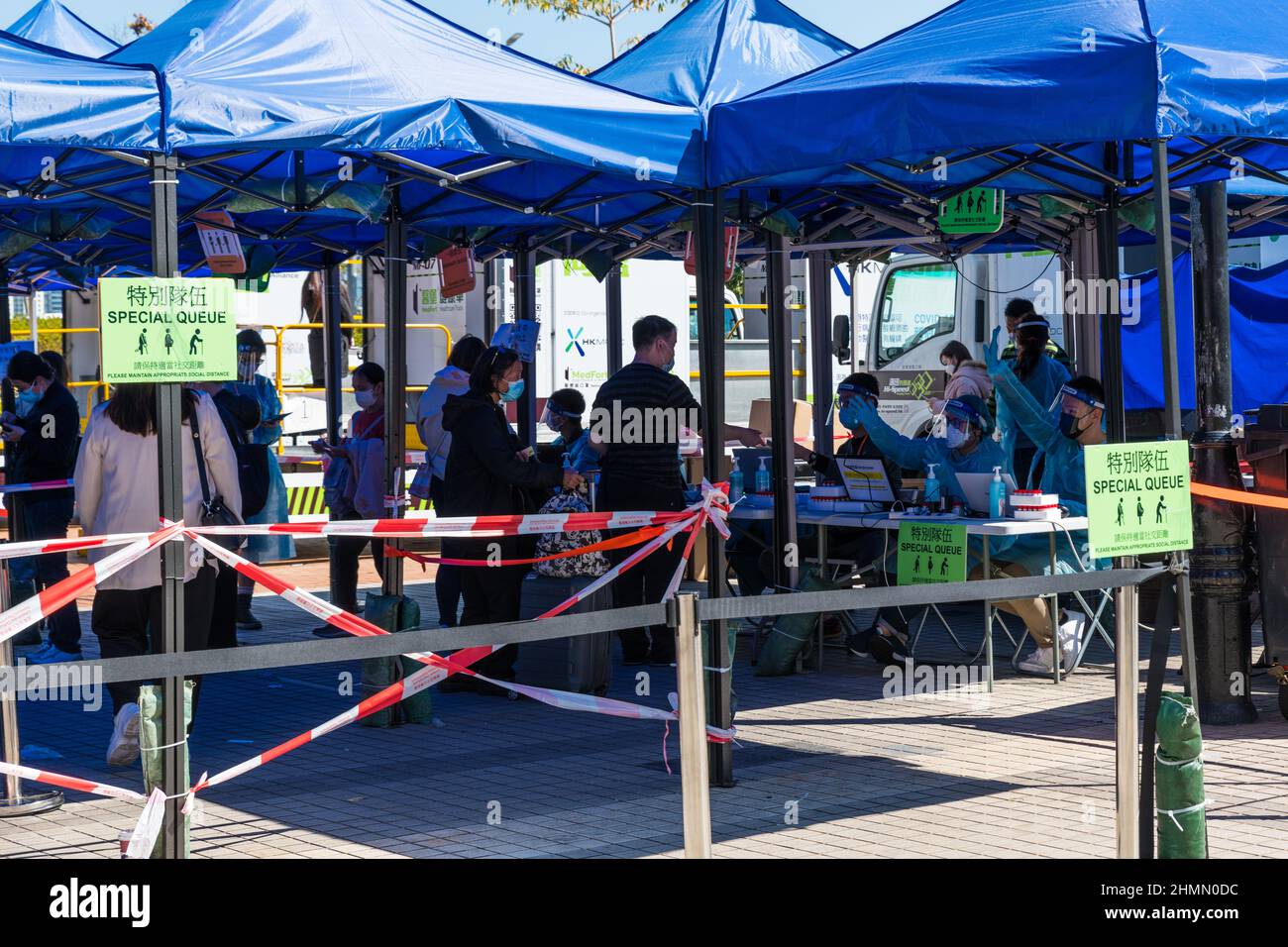 Hong Kong, China. 11th Feb, 2022. People register at an open air testing ground at Endinburgh Place in Central Hong Kong. Credit: Visions of Asia/Alamy Live News Stock Photo