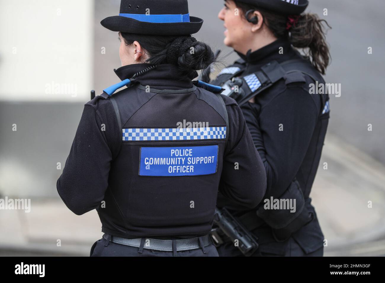 Female PCSO and Police officer on duty in Winchester, Hampshire, UK Stock Photo