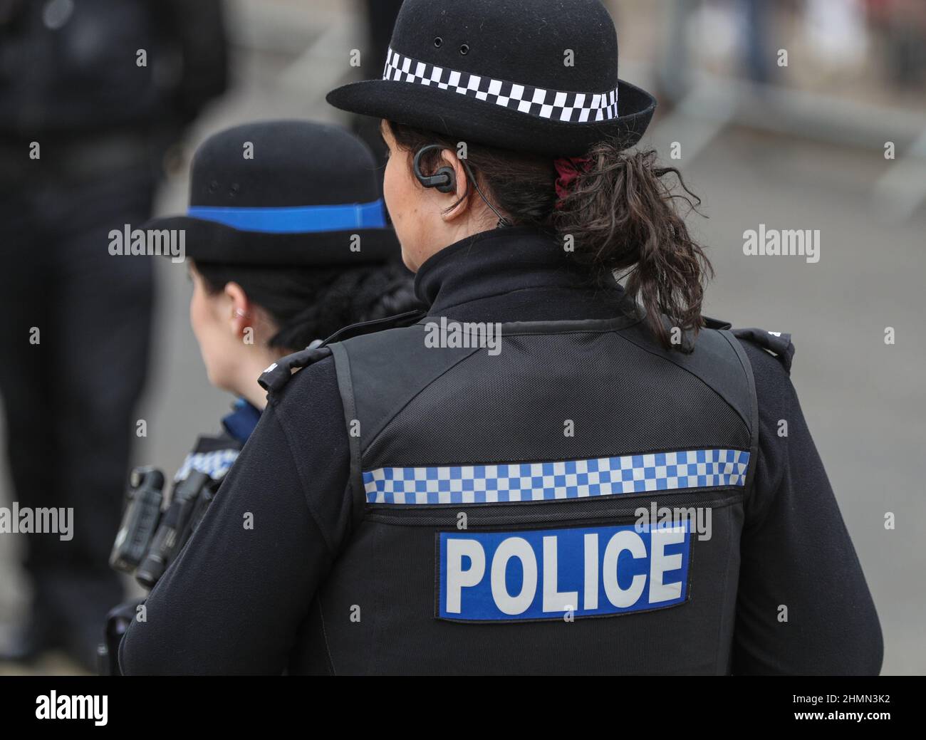 Female PCSO and Police officer on duty in Winchester, Hampshire, UK Stock Photo