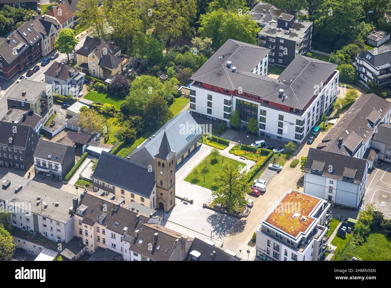 Aerial view, Seniorenpark Diakoniezentrum Heiligenhaus und evang. Old church, Leubeck, Heiligenhaus, Ruhr area, North Rhine-Westphalia, Germany, old p Stock Photo