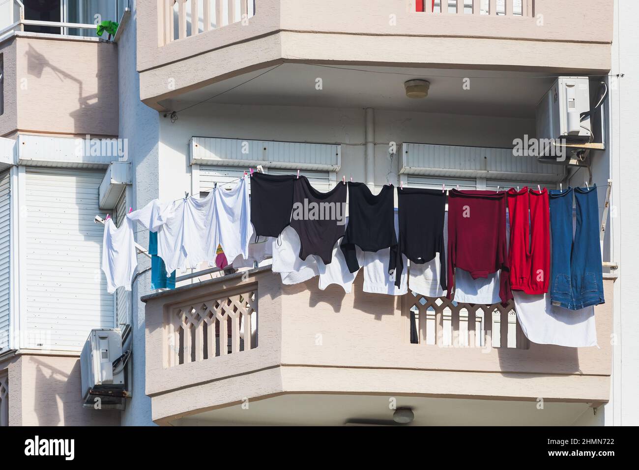 A white house in an turkish city, laundry is drying on a rope Stock