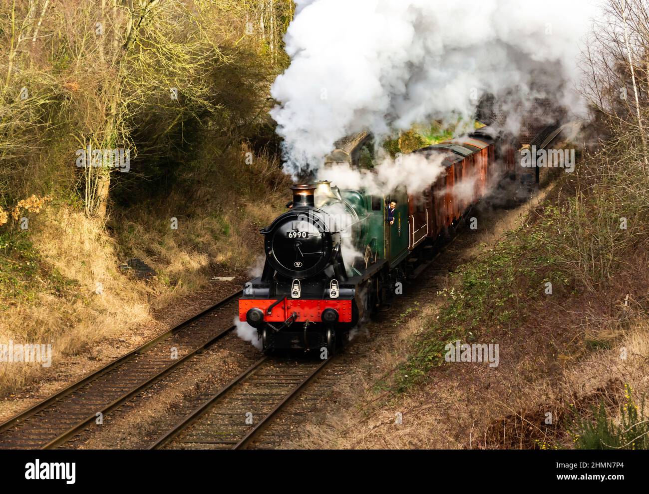 GWR Hall locomotive  4-6-0 No.6990 hauling a Freight train on the Great Central Railway Stock Photo