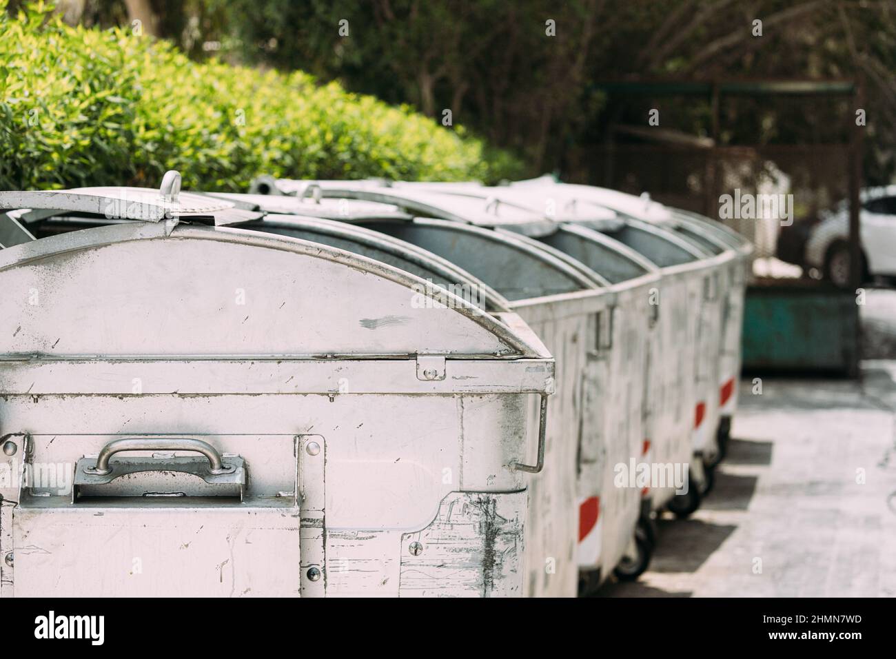 Waste containers on wheels for separate collection of garbage
