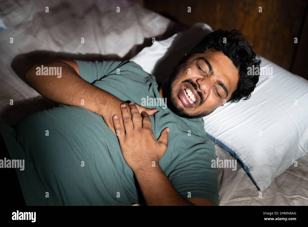 Young man chest pain hires stock photography and images Alamy