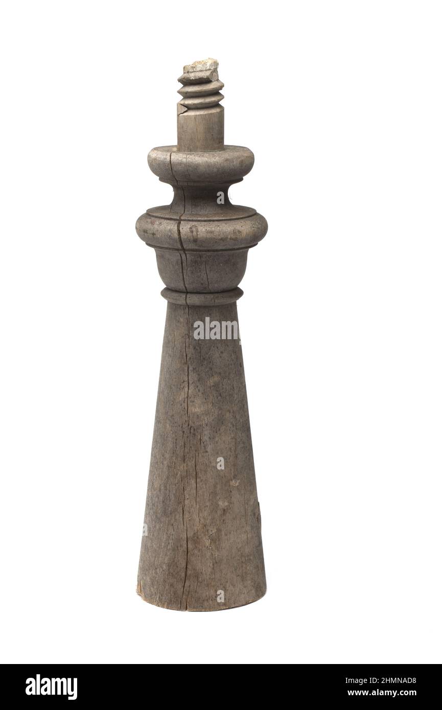 Close up of very old weathered turned cut wooden column baluster with ...