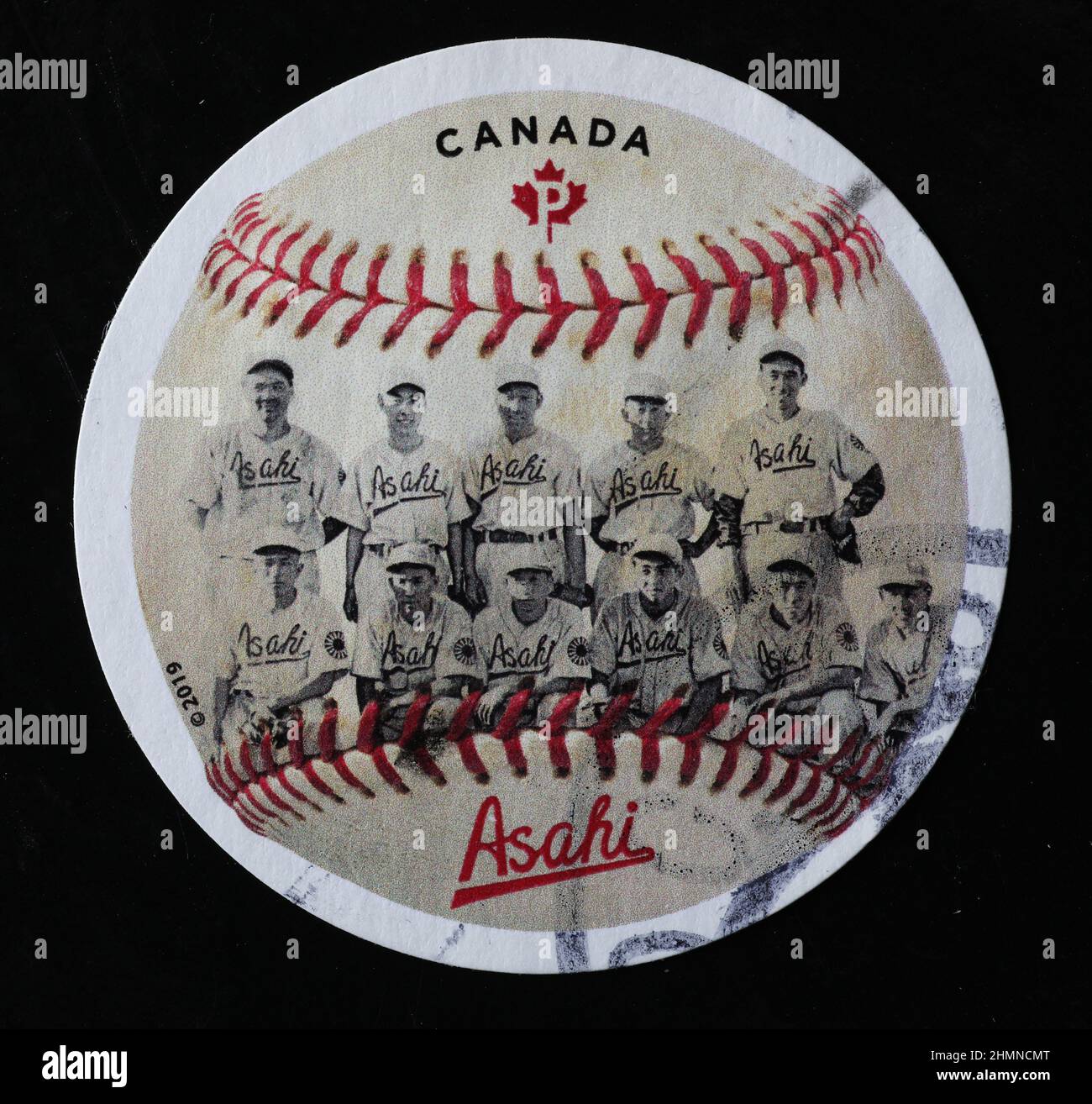 Asahi Baseball Club of 20th century on canadian postage stamp Stock Photo