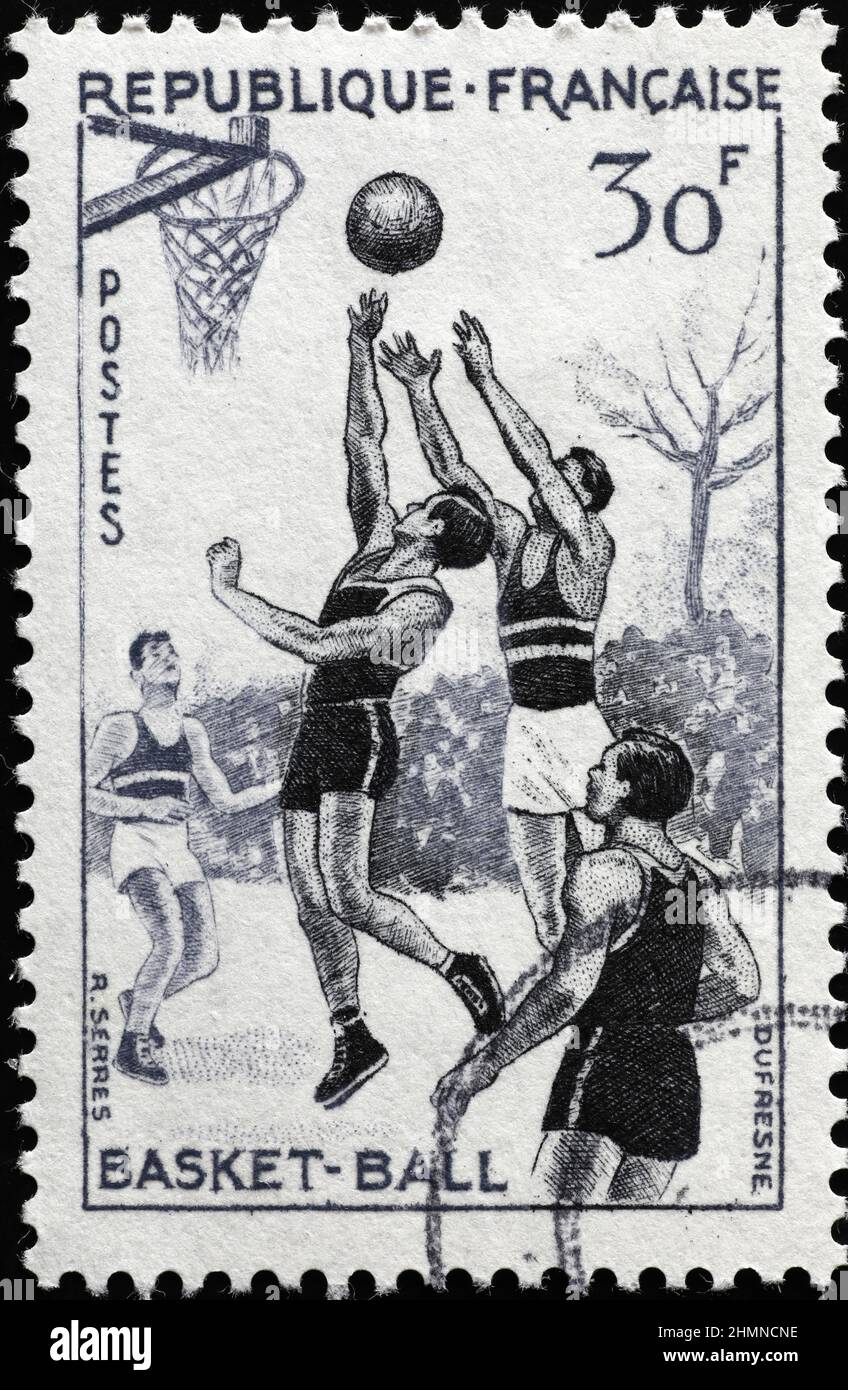 Basketball celebration on vintage french stamp Stock Photo