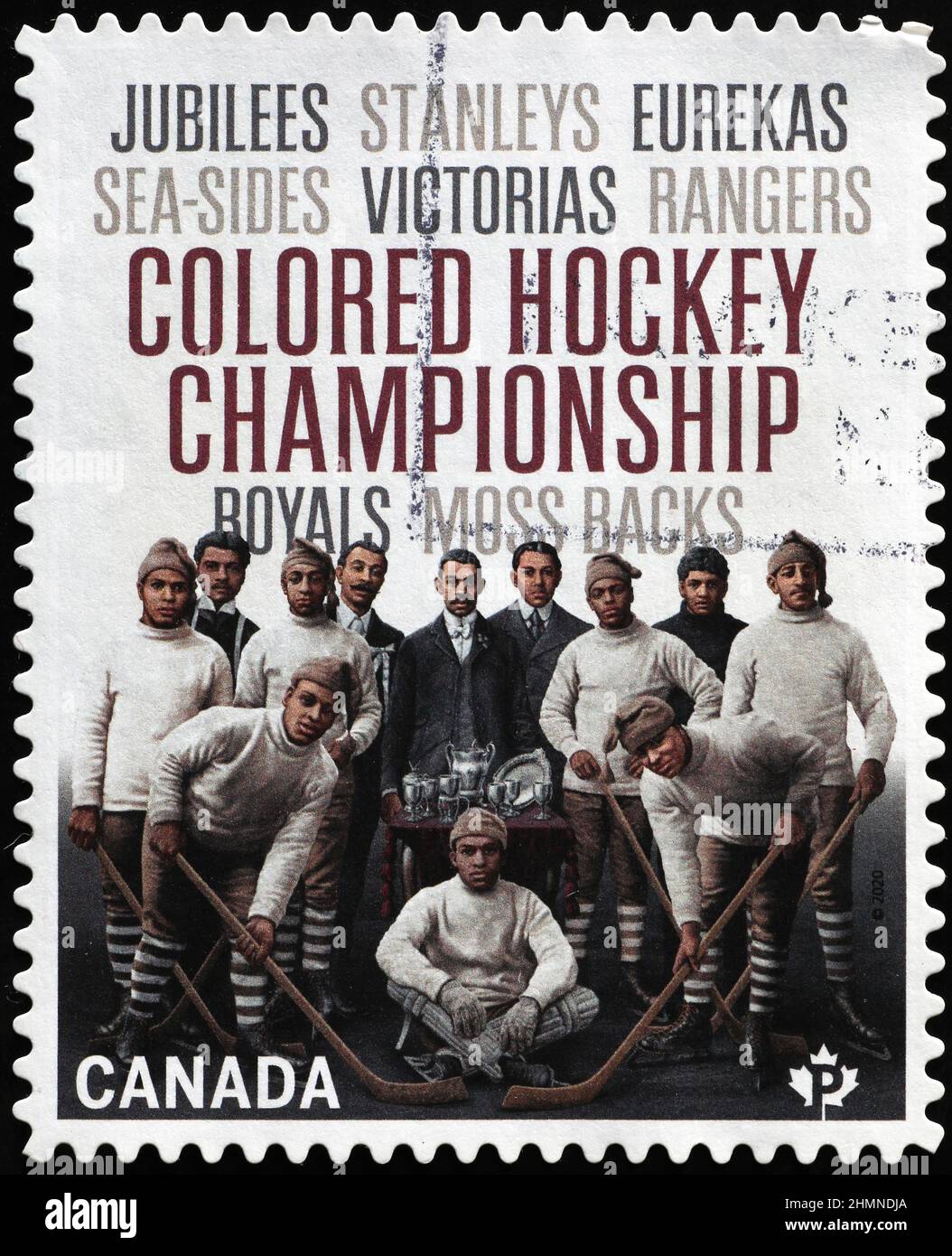 Colored hockey championship celebrated on canadian postage stamp Stock Photo