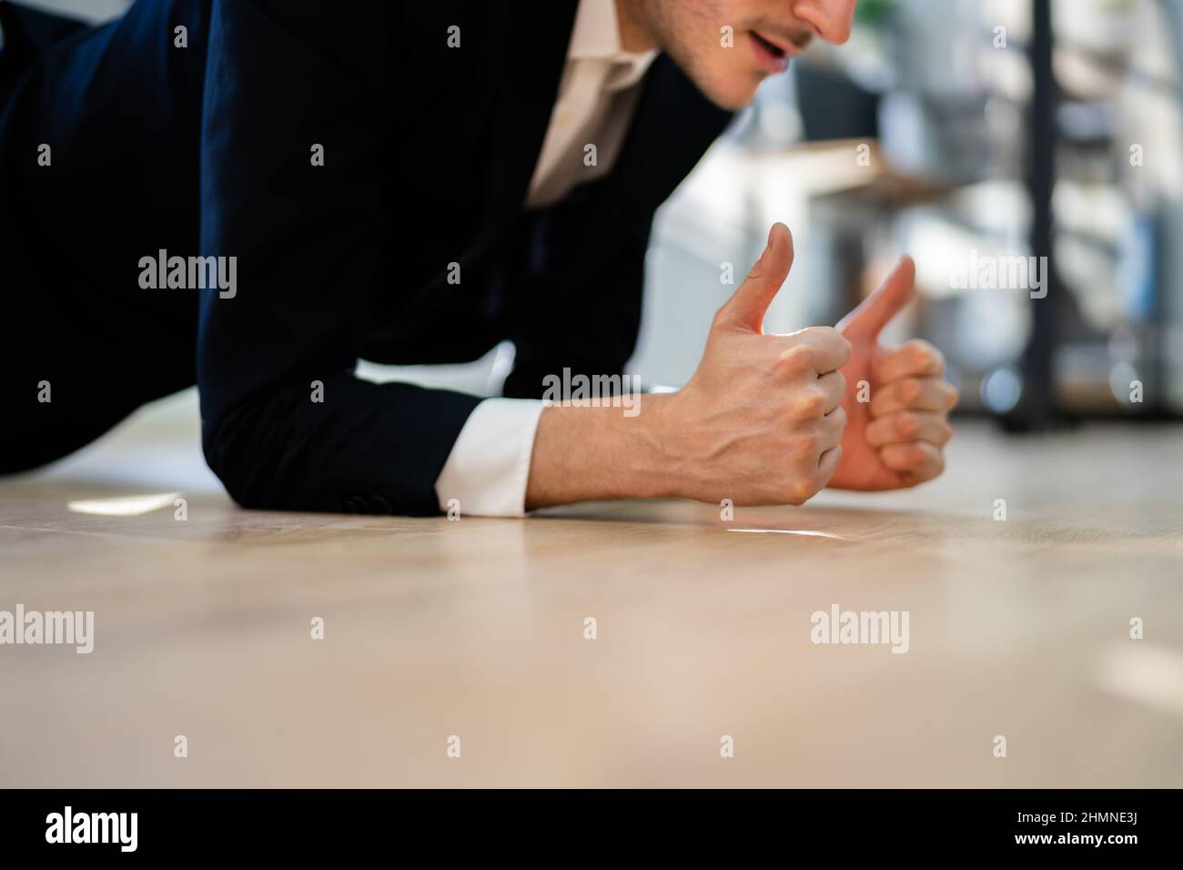 Man Doing Office Plank Exercise Workout Training Stock Photo