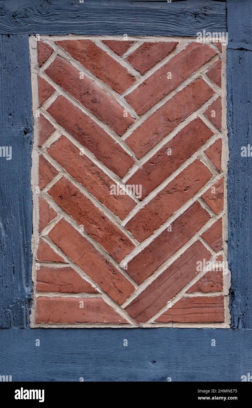Fishbone pattern laid in brick, brick-lined infill at a historic half-timbered house in the Old Town of Quedlinburg, Saxony-Anhalt, Germany, Europe. Stock Photo