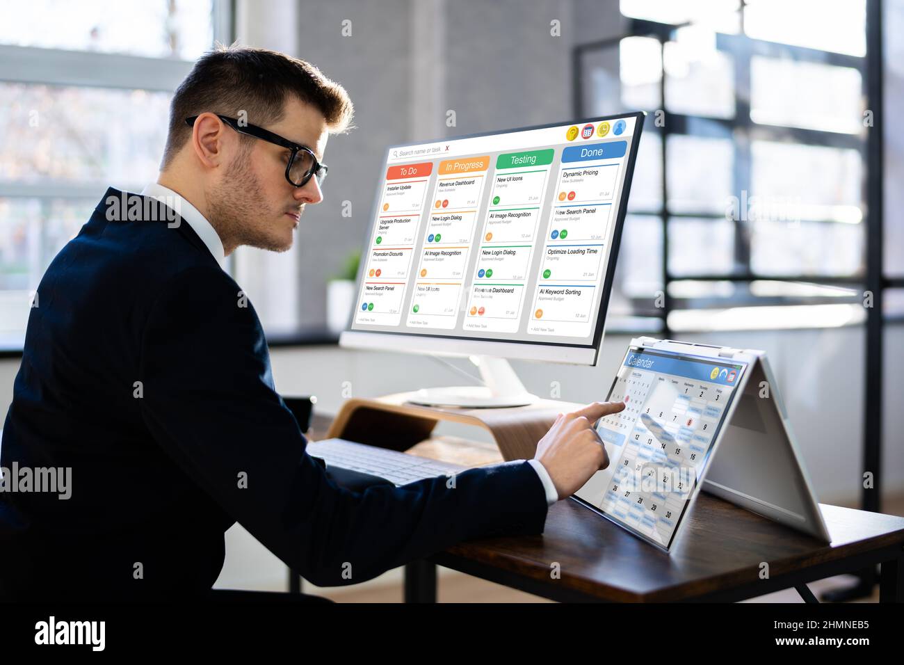 Gantt Tasks Schedule Chart On Computer In Office Stock Photo