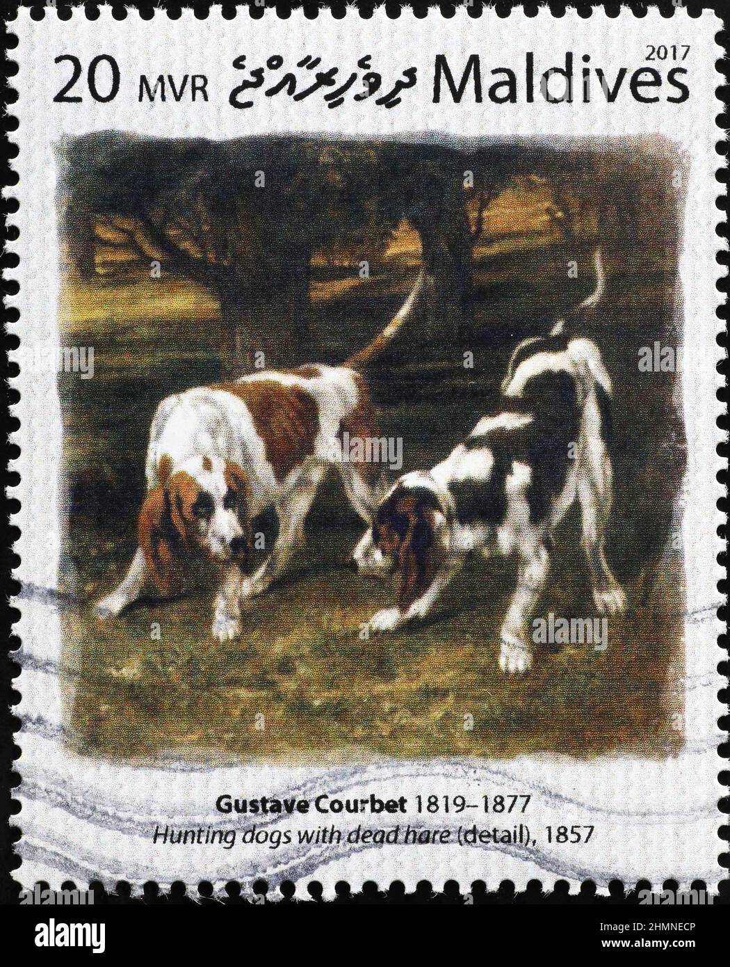 Hunting dogs by Gustave Corbet on postage stamp Stock Photo