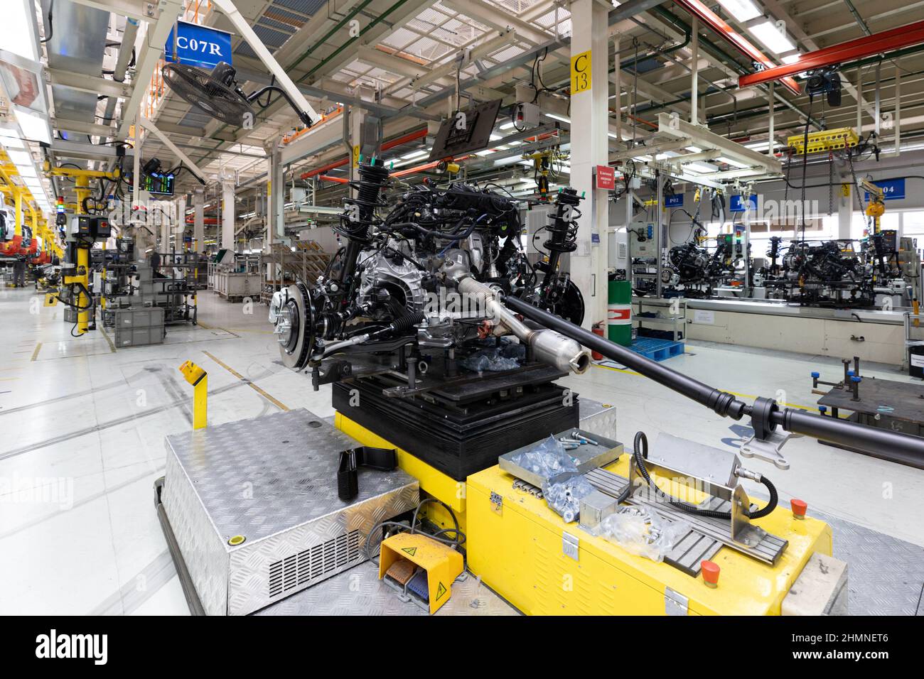 Photo of car bodies are on assembly line. Factory for production of ...
