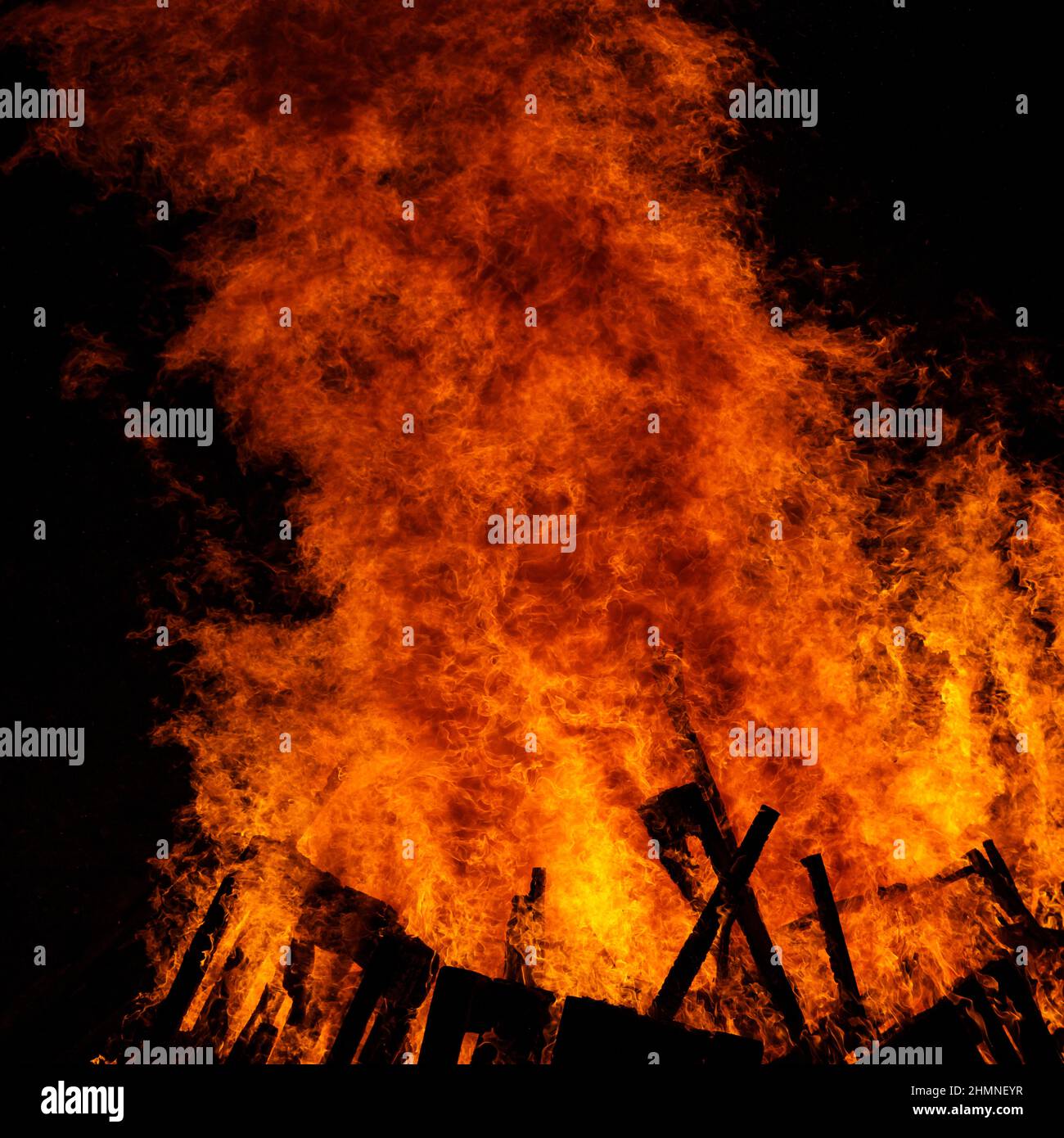 Big fire on the dark background. Huge bonfire at night Stock Photo