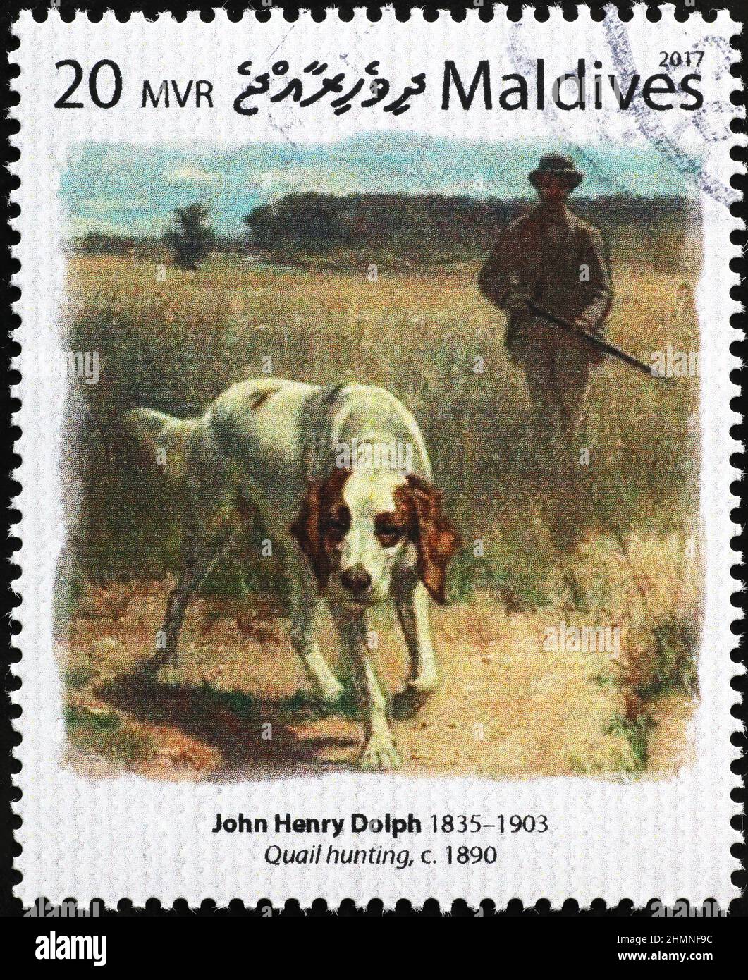 Quail hunting by John Henry Dolph on postage stamp Stock Photo