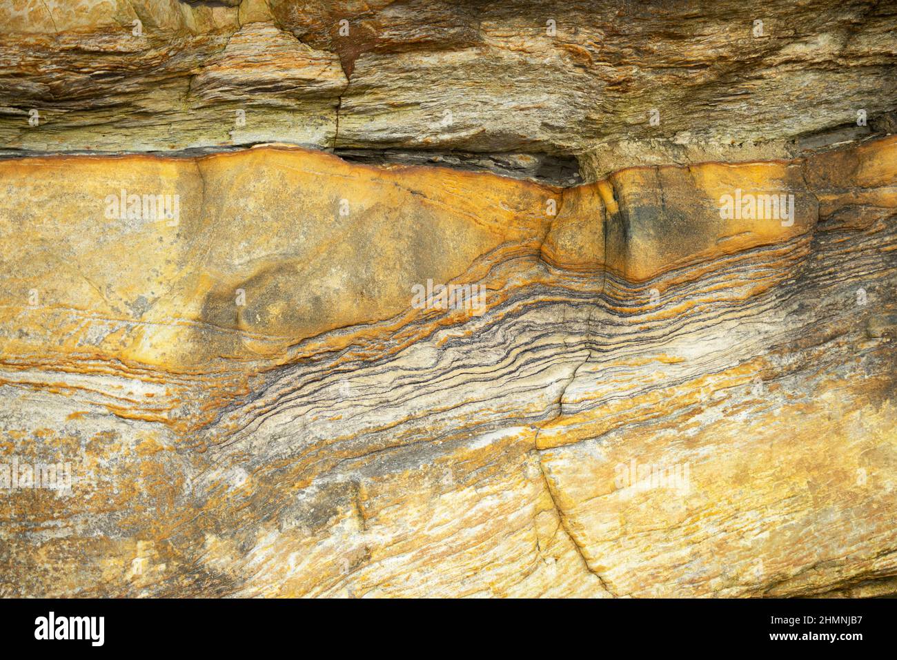 The different layers of sandstones deposited during the Jurassic period show variation and duration of climatic conditions and the environment Stock Photo