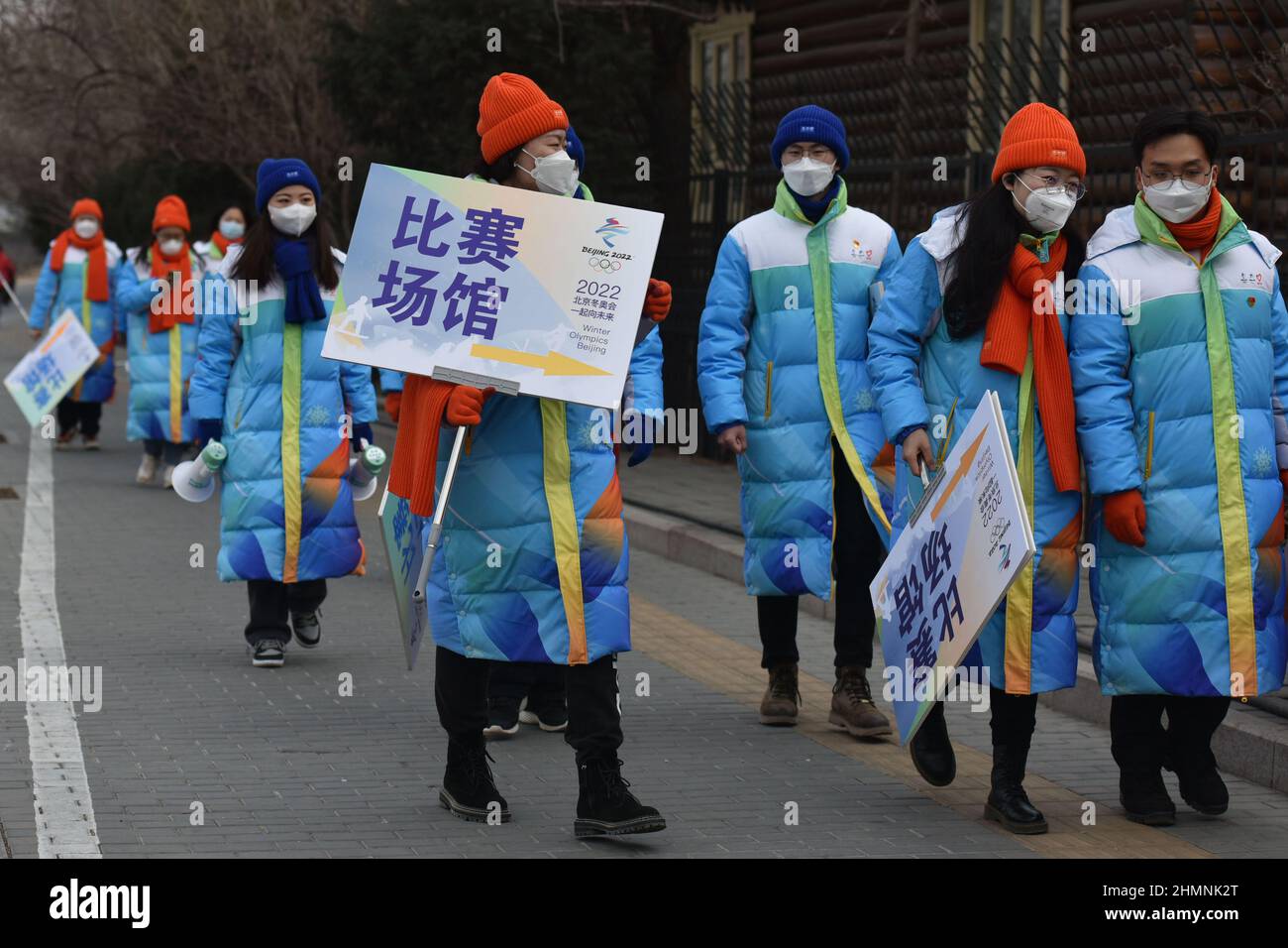 Beijing, China. 11th Feb, 2022. Volunteers wearing masks for the 24th