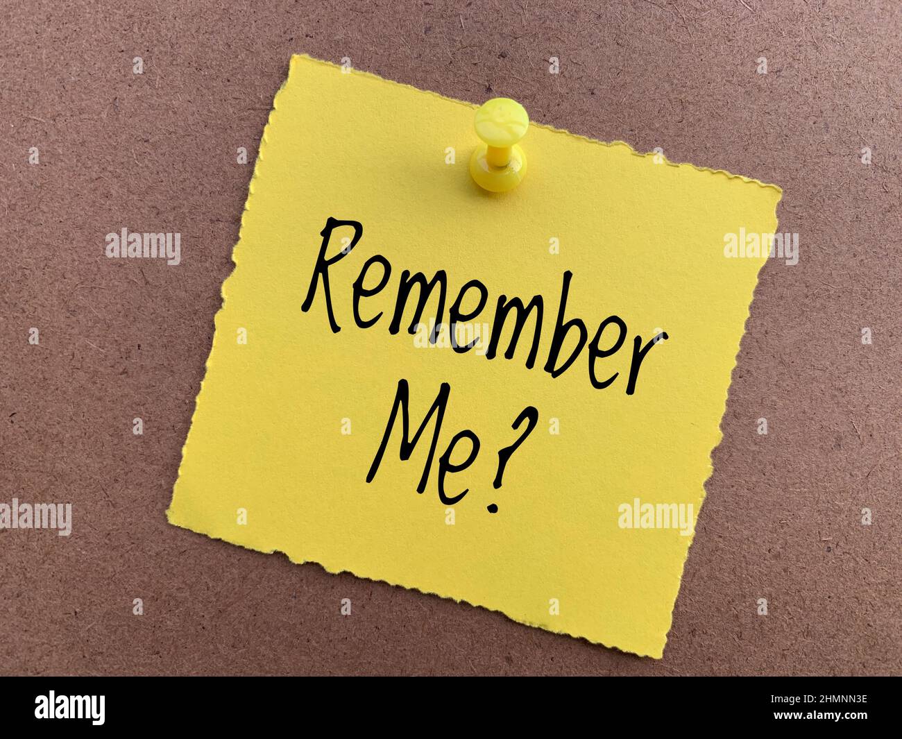 Remember me text on yellow sticky note. Conceptual. Stock Photo