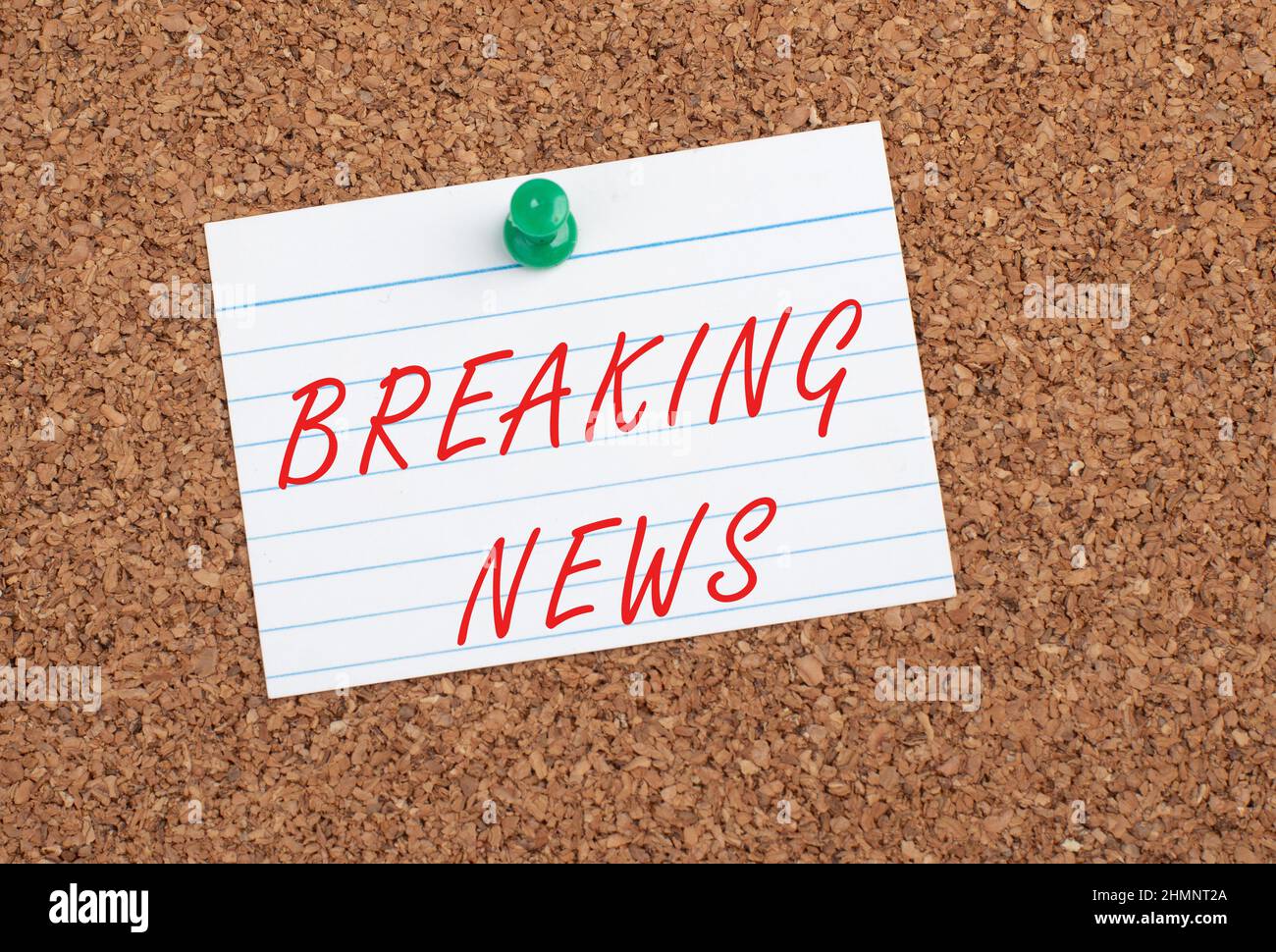 Breaking news is standing on a pinned paper, political message, time story, text Stock Photo