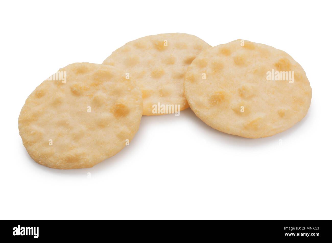 Studio shot of rice crackers cut out against a white background - John Gollop Stock Photo