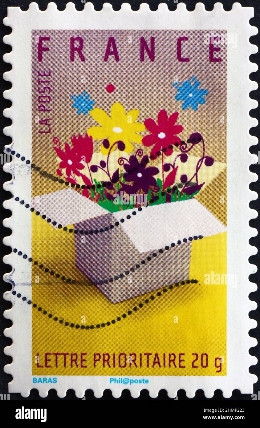 FRANCE - CIRCA 2007: a stamp printed in France shows a box full of flowers, gift box, circa 2007 Stock Photo