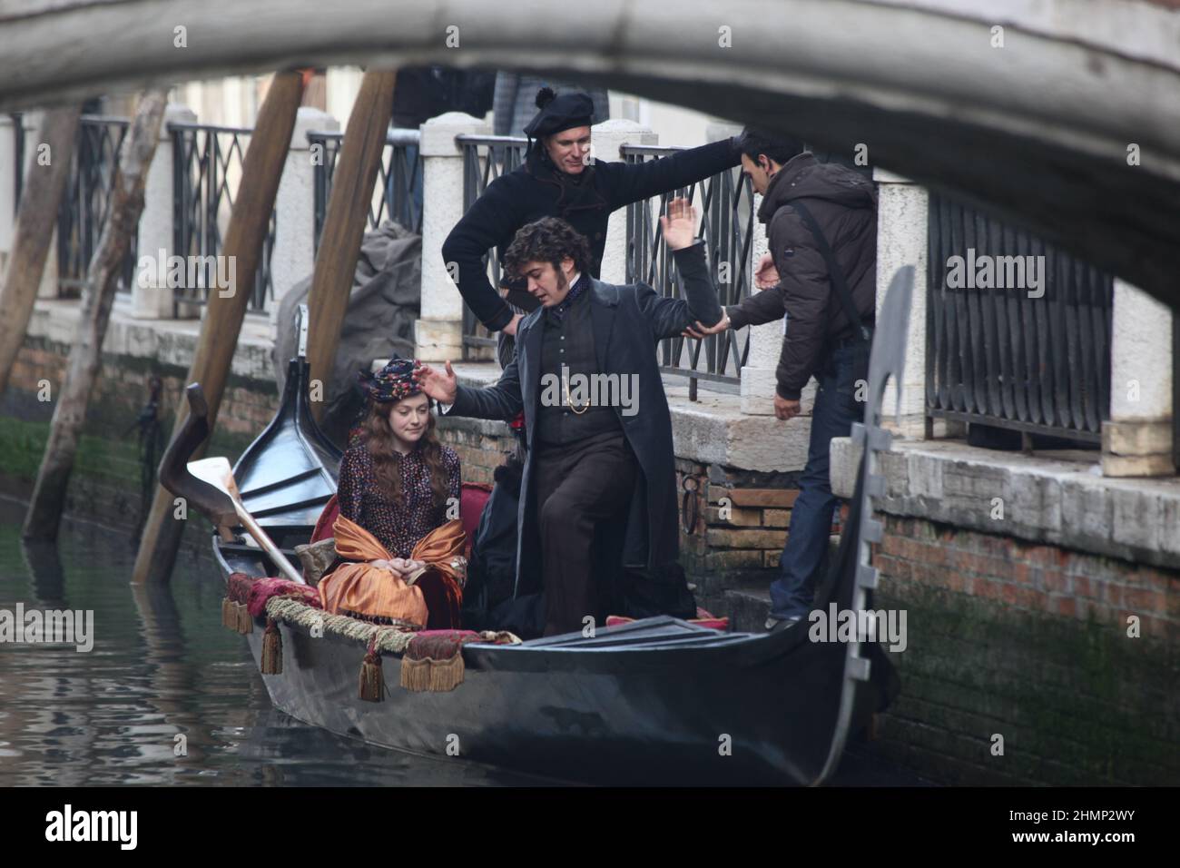 Actress Dakota Fannin, Actress Claudua Cardinale and actor Riccardo Scamarcio during the filming of the film Effie Gray in Venice. Stock Photo