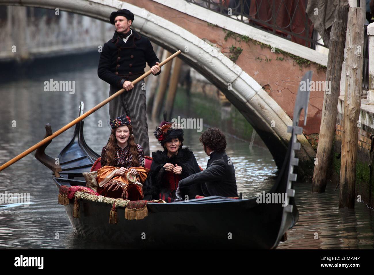 Actress Dakota Fannin, Actress Claudua Cardinale and actor Riccardo Scamarcio during the filming of the film Effie Gray in Venice. Stock Photo