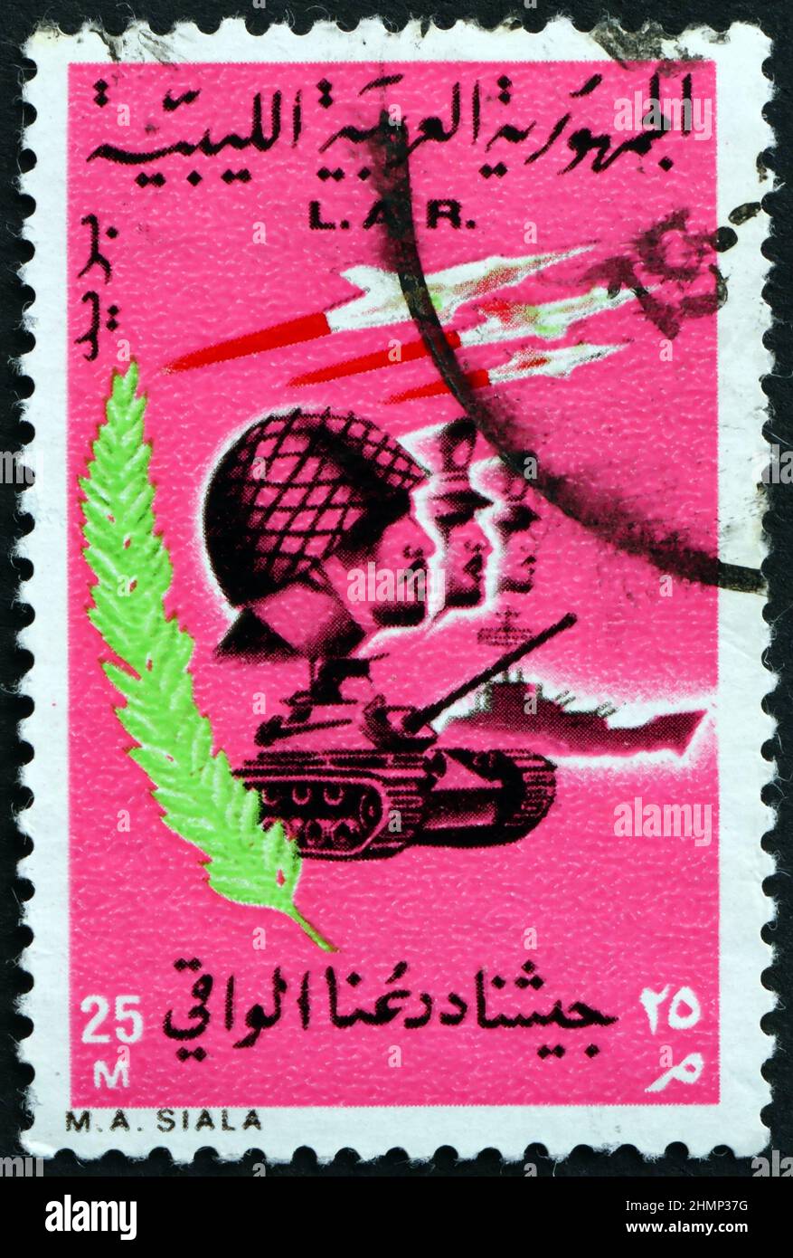 LIBYA - CIRCA 1969: a stamp printed in Libya shows Soldiers, Tanks and Planes, Establishment of Libyan Arab Republic, September 1, 1969, circa 1969 Stock Photo