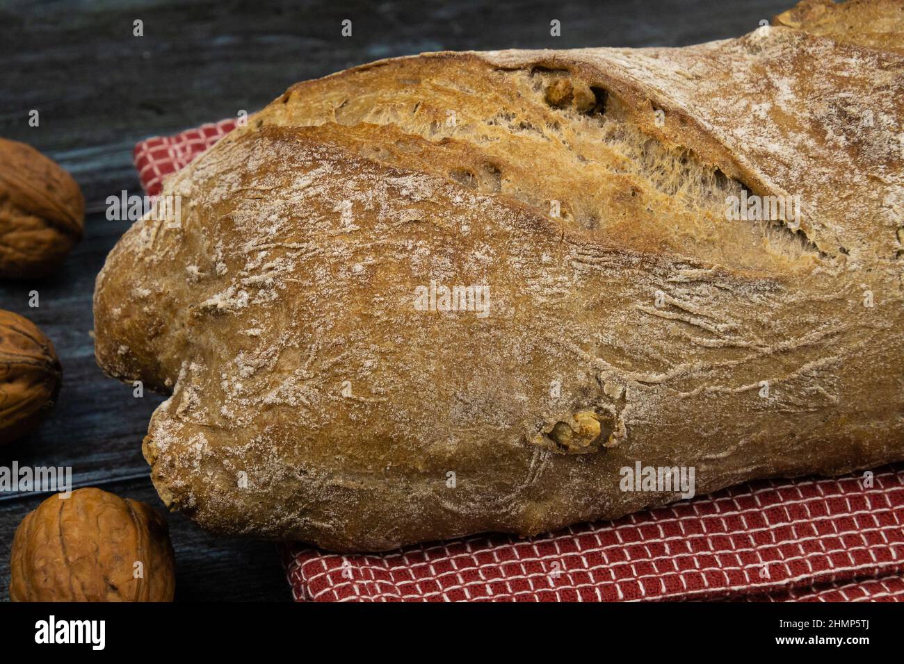 whole nut bread on a gray background with fresh nuts Stock Photo - Alamy