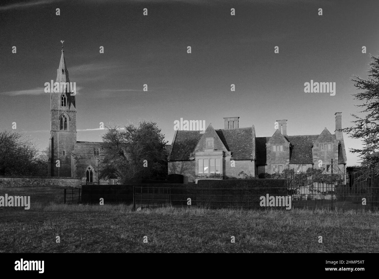 All Saints Church and Pilton Manor, Pilton village, Northamptonshire, England, UK Stock Photo