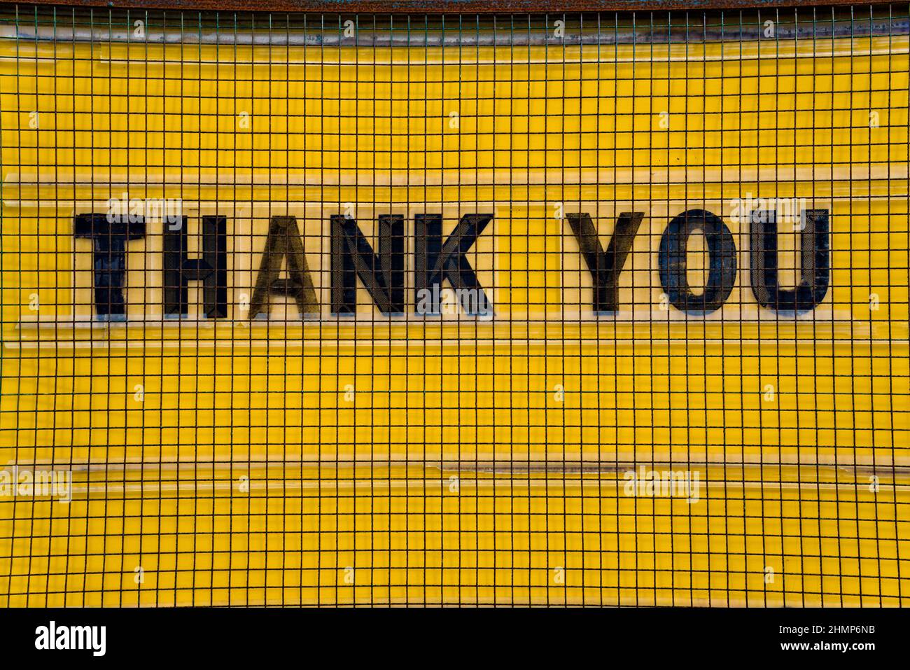 Yellow thank you sign with black letters hi-res stock photography and