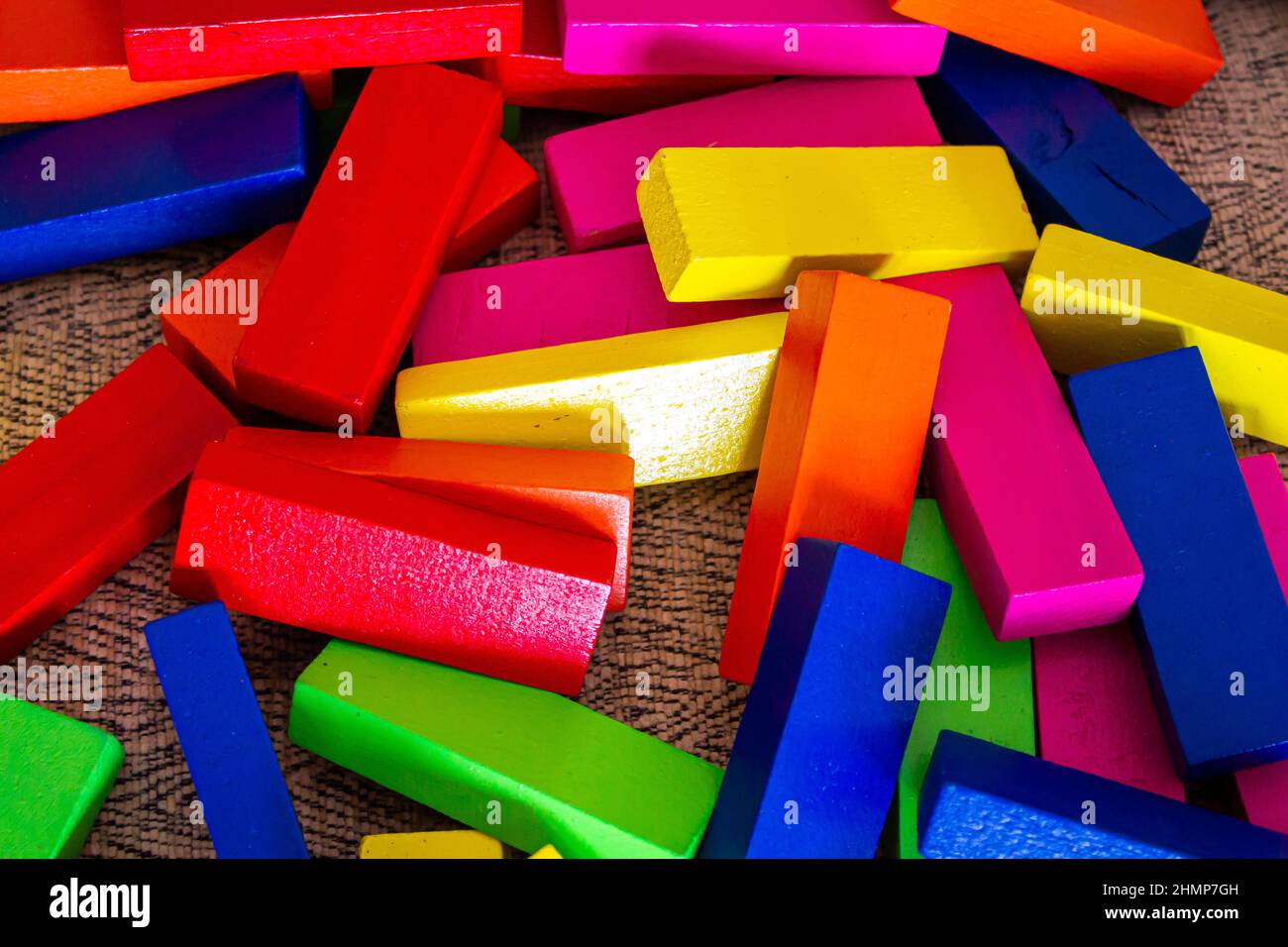 Wooden tower game blocks closeup. Top view of colorful blocks Stock