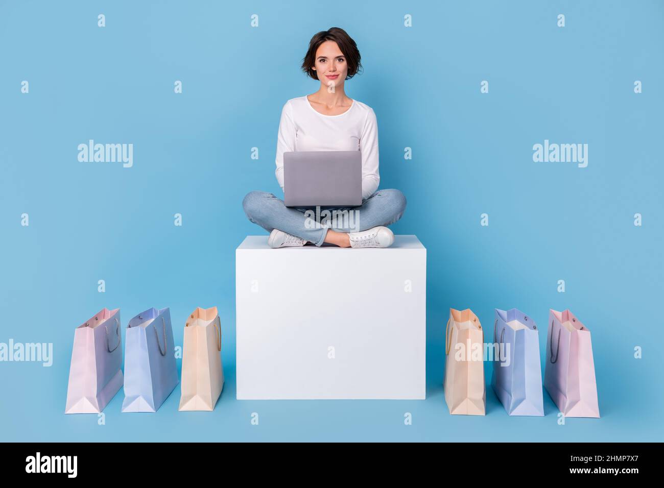 Photo of pretty cute lady dressed white shirt online shopping sitting ...