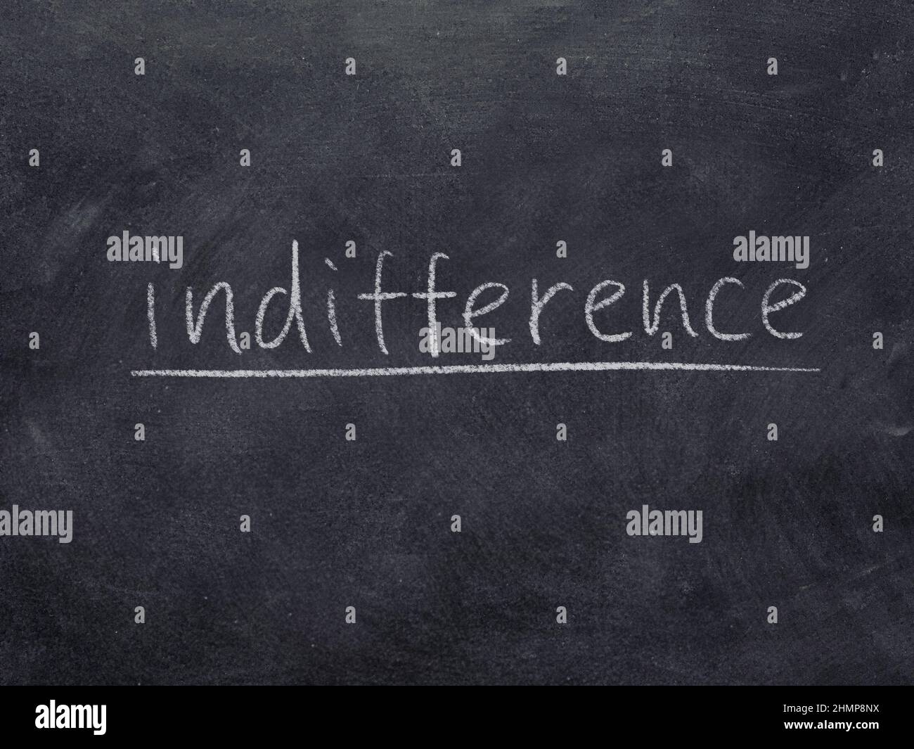 indifference concept word on blackboard background Stock Photo - Alamy