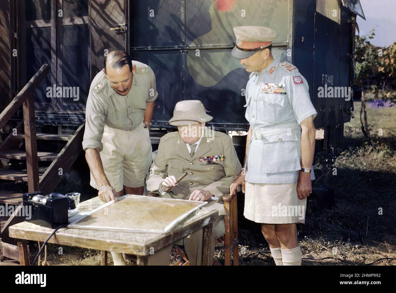 Winston Churchill (1874-1965) discussing the battle situation in Italy. Between 1939 and 1945. War Office official photographer, Tanner (Capt). Stock Photo