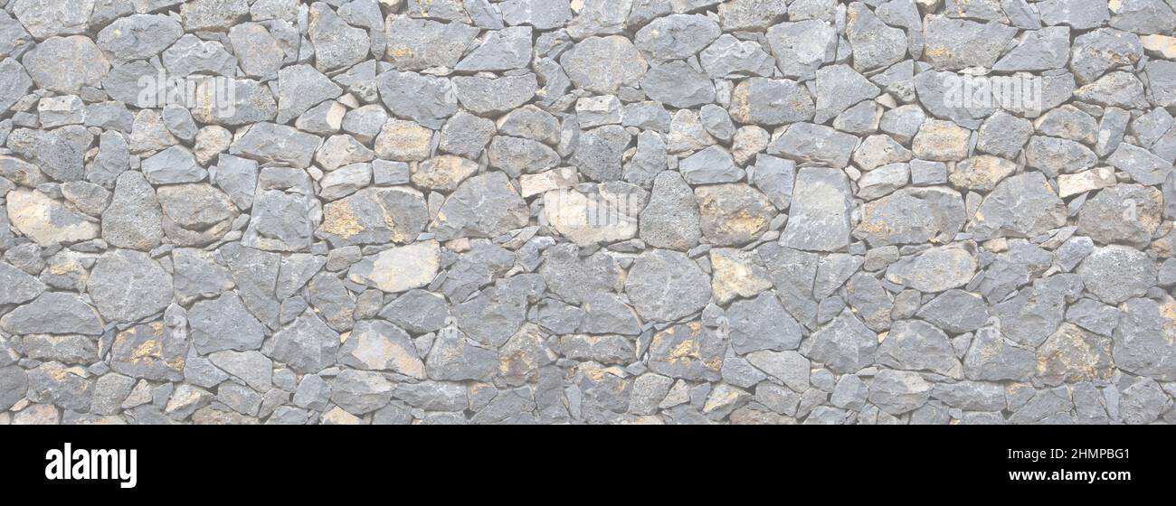 wild stone wall background for your design Stock Photo