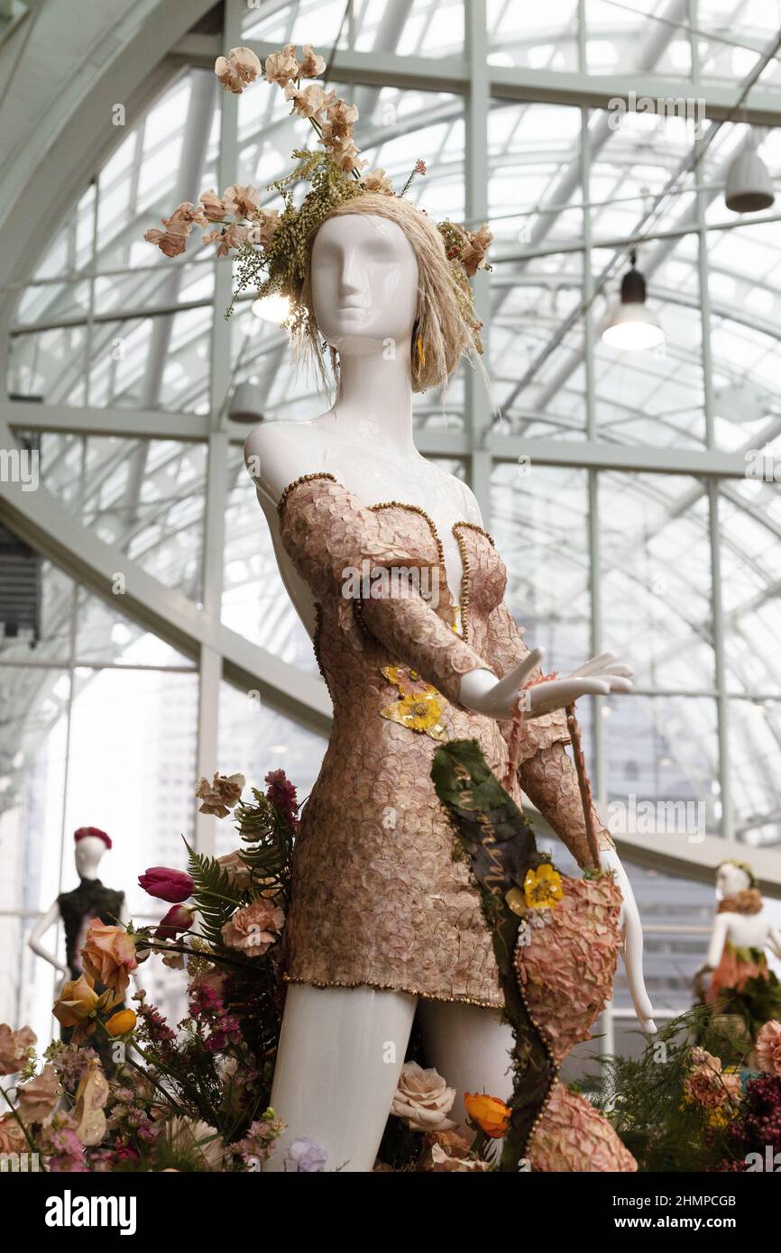 Mannequin wearing floral fashion design by Fleurs de Villes at the Northwest Flower and Garden show in Seattle, Washington. Stock Photo