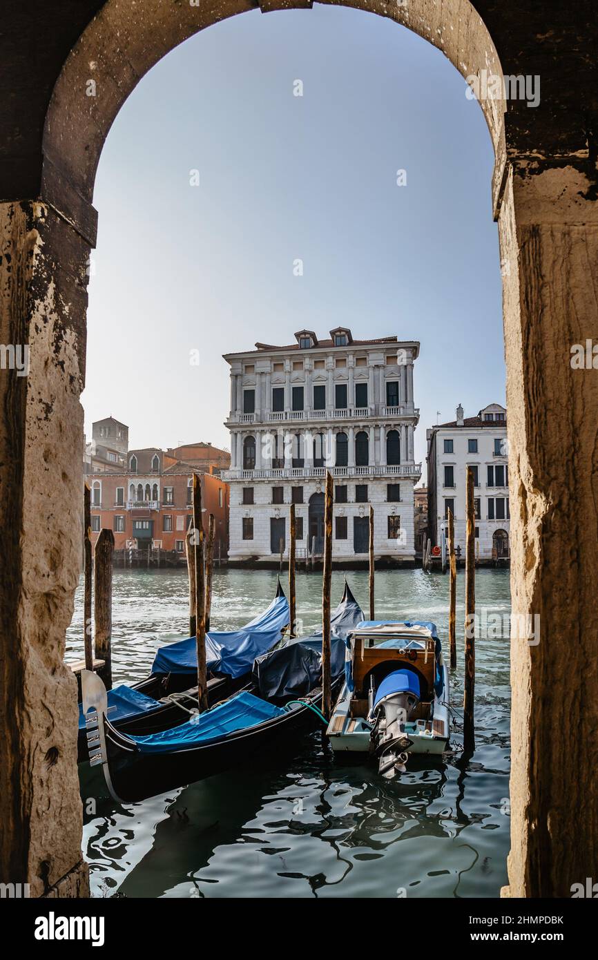 Grand Canal,Venice,Italy.Typical boat transportation.View of gondola,Venetian tourist attraction.Water transport.Travel urban scene.Popular travel des Stock Photo